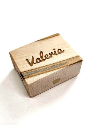 a wooden box with the word valeria engraved on it