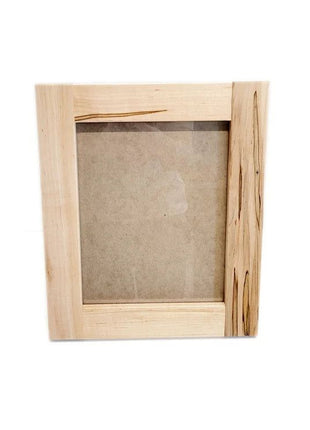 A wooden frame with a blank canvas inside, set against a white background.