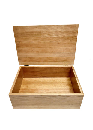 a wooden box with a lid open on a white background