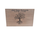 The image is a wooden plaque with a tree design and the text 