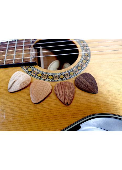 a close up of a guitar's frets and strings