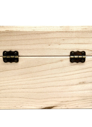 a wooden box with black handles on a white background