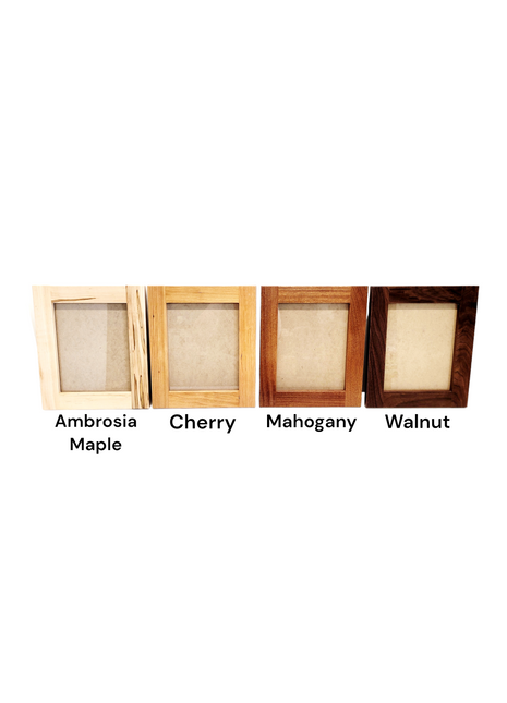 a group of four wooden frames sitting next to each other