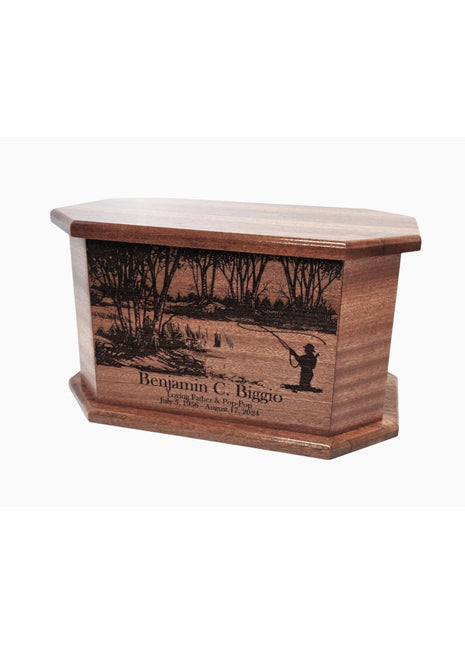 A wooden urn with a carved image of a person fishing in a river, surrounded by trees.