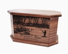 A wooden urn with a carved image of a person fishing in a river, surrounded by trees.