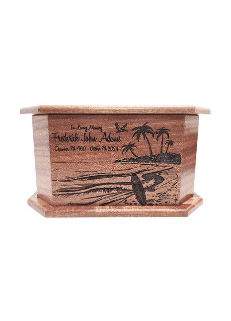 A wooden urn with a carved design depicting a beach scene with palm trees and a surfer.