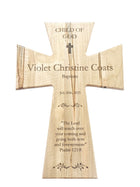 The image is a wooden cross with a Bible verse engraved on it.