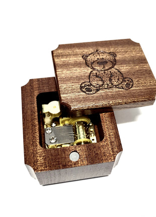 a wooden box with a lighter inside of it