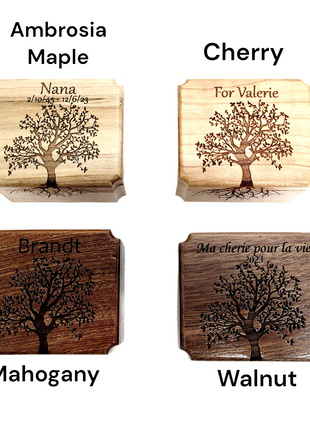 four wooden coasters with different designs on them
