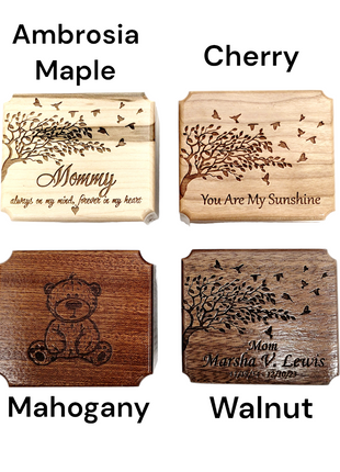 four rubber stamps with different designs on them