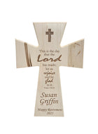 A wooden cross with a Bible verse and a personalized message for Susan Griffin, who is celebrating her retirement.